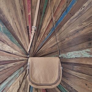 Vince Camuto leather fold over transformer messenger bag beige medium